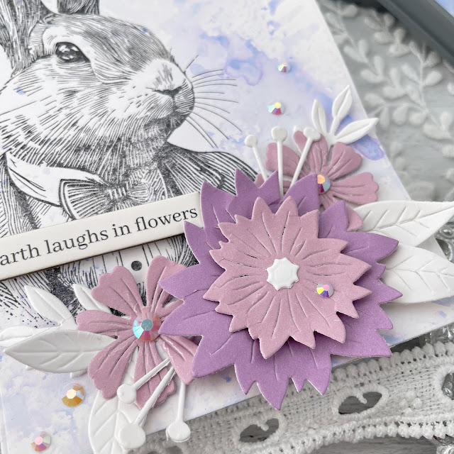 Easter tag created with Tim Holtz Mr. Rabbit stamp, Shaded Lilac Distress Oxide, and Scrapbook.com Market Bloom Florals Die.