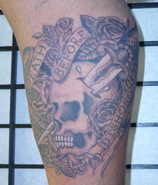 This Death Before Dishonor tattoo is done in an Old School style that is 