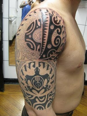 Big tribal tattoo on man strong