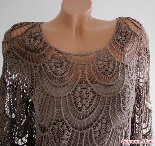 Beautiful crochet blouse with a sophisticated designer. Accompany or graphic.