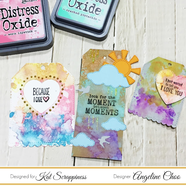 ScrappyScrappy: Distress Oxide Tags with Kat Scrappiness #scrappyscrappy #katscrappiness #timholtz #oxideink #distressoxide #watercolor #mixedmedia #nuvodrop #unitystampco #stamp #stamping #diecut #ginamariedesigns