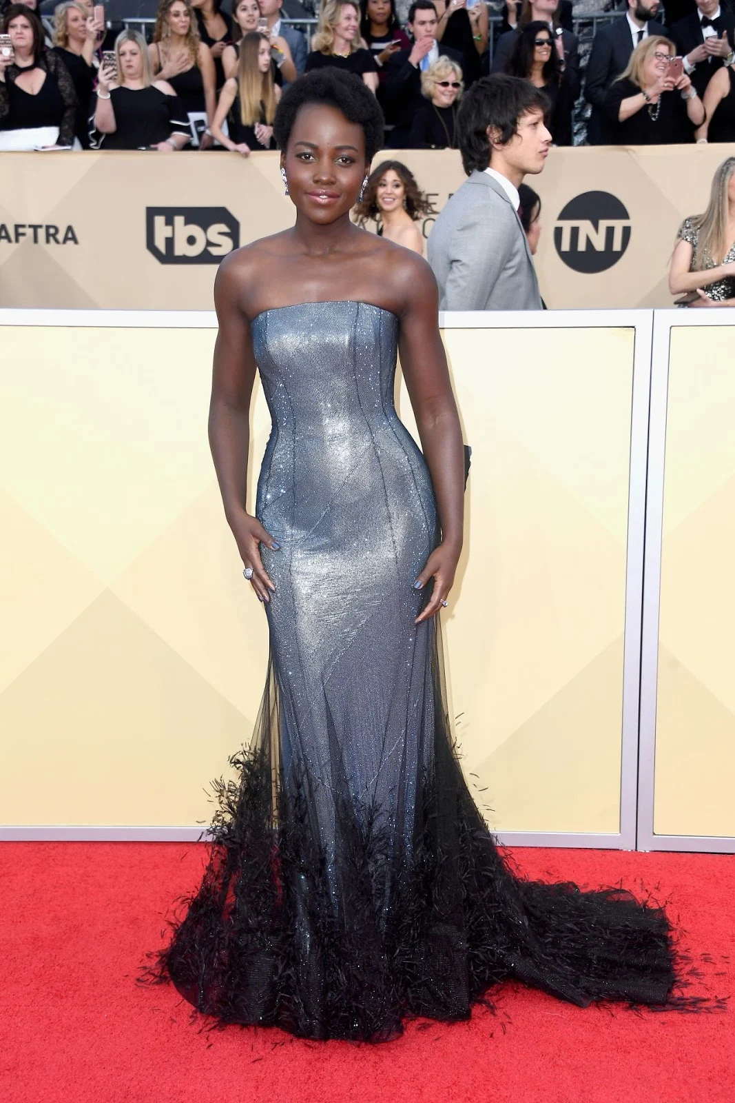 Lupita Nyong'o shimmers in silver at the 2018 SAG Awards