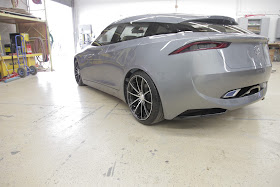 Rear 3/4 view of Mazda Deep Orange 3