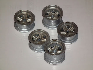 re-coated Tamiya POrsche 910 wheels to dull them down.