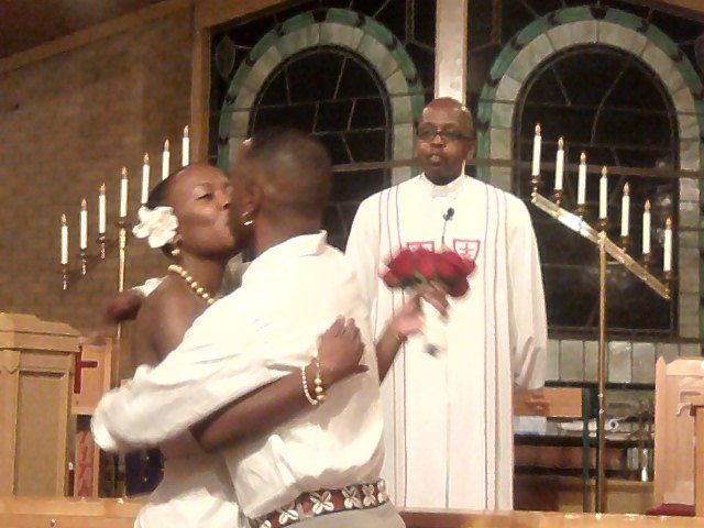  small wedding ceremony at Newman AME Church in Pontiac MI at 700pm