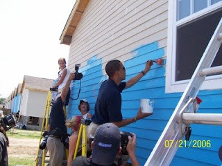 Obama painting houses