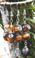 wire wrapped dangle earrings with tiger eyes