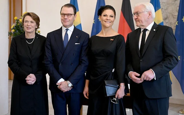Crown Princess Victoria wore a new navy blue dezire wool coat by Andiata, and black dress by Andiata. Elke Büdenbender