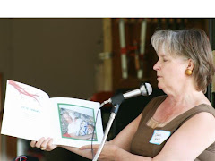 Reading my book at our family reunion.