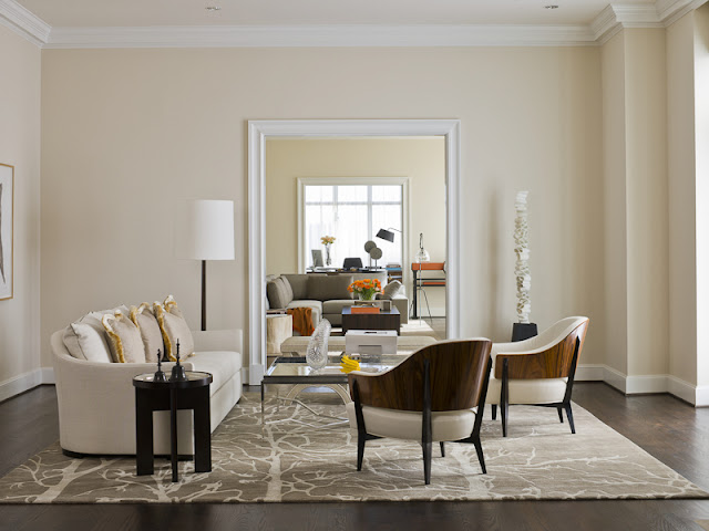 Photo of bright room with sofa and coffee table