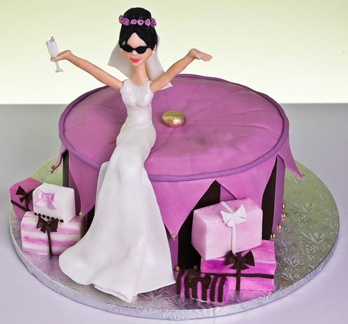 Round Purple Bridal Shower Cake With A Bride Wedding Cake Topper