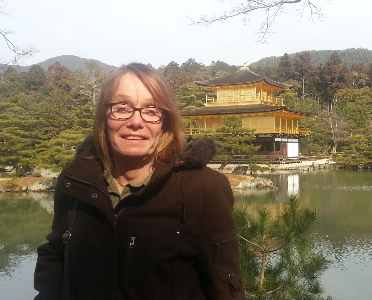 Me, in Kyoto, 4 months post-transition, squinting into the rising sun.