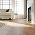 What are the pros and cons of laminate flooring?