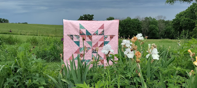 Half-square triangle star baby quilt