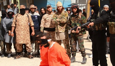 Militants of ISIS execute two Syrian men on charges of leaking information to Syrian rebels in Hasakah