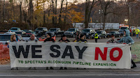 The Montrose 9 and their allies block Spectra Energy from working on its pipeline project. (Credit: Erik McGregor) Click to Enlarge.