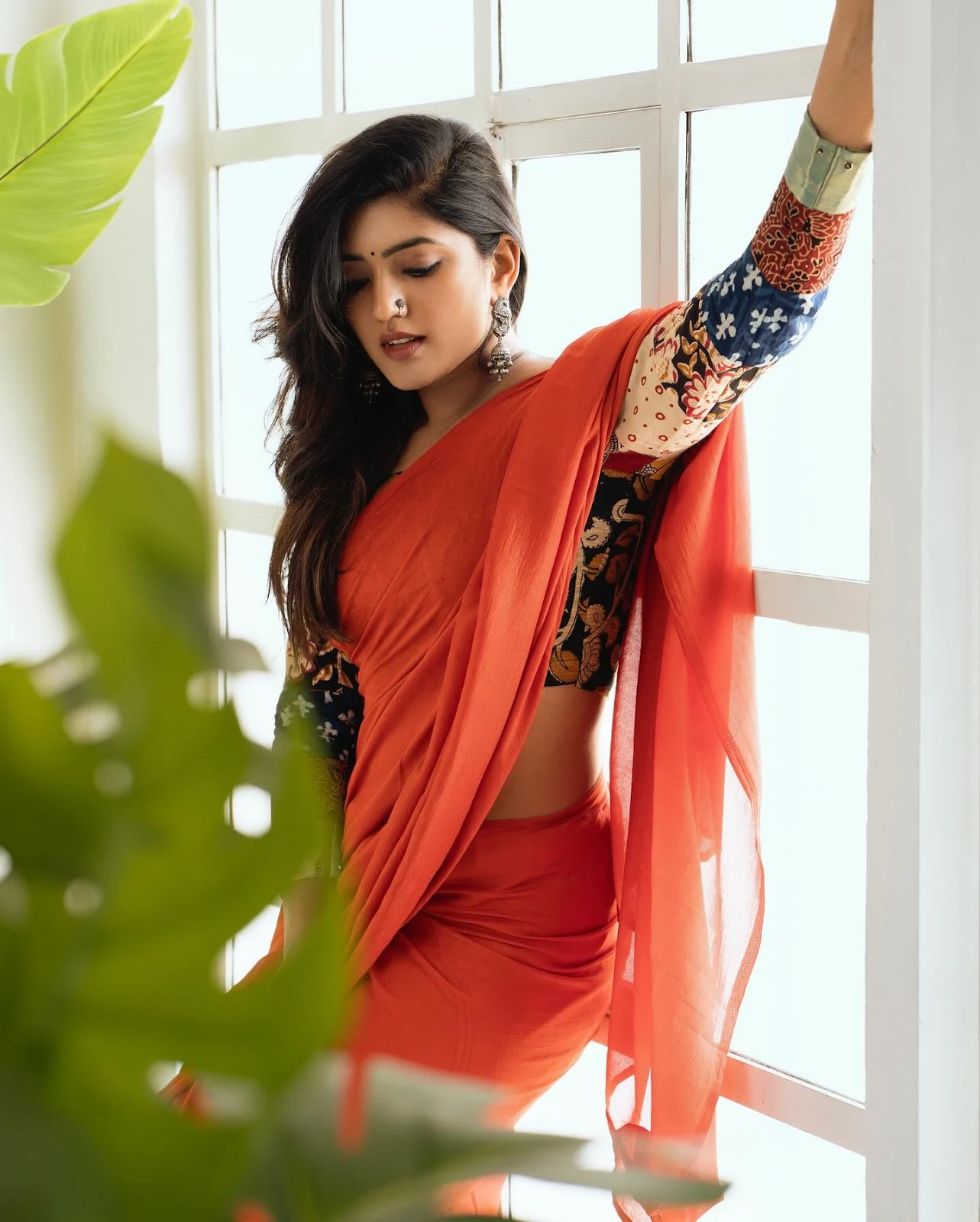 Eesha rebba stylish photoshoot in red color saree