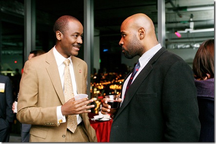 Otis Rolley, left, and Babila Lima, Office of Council President, right,