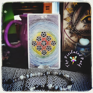 The 10 of Pentacles card from the Wild Unknown Tarot.