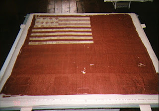 Art conservation of the Brandywine Flag by textile conservator Gwen Spicer, historic flags, Revolutionary War, repair and restoration