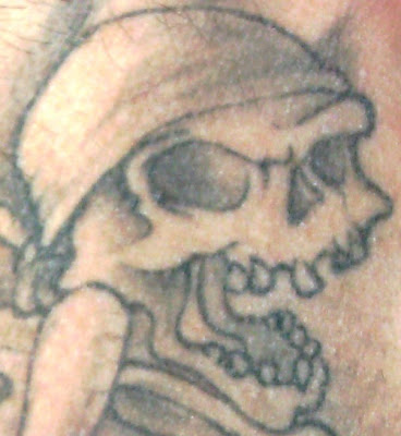 skull tattoo filler. Two Tattooed Tourists on a