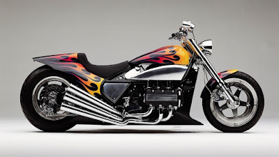 A motorcycle featuring vibrant flames painted along its side.