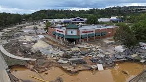 Flooded streets and damaged homes in North Carolina after Hurricane Helene.
