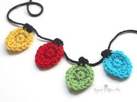 http://www.repeatcrafterme.com/2015/11/crochet-christmas-light-appliques.html