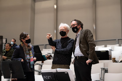 Photo of director Elkanah Pulitzer, composer John Adams, and SFO General Director Matthew Shilvock, masked, in the Atrium Theater