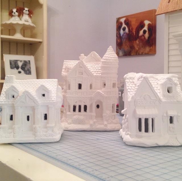 Unpainted plaster Christmas village houses by California Creations