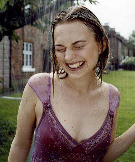 Sophia Myles Wet Photoshoots in Rain in Purple Top