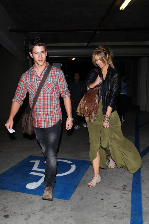 Nick Jonas Holds Rapidly to New Girlfriend Delta Goodrem