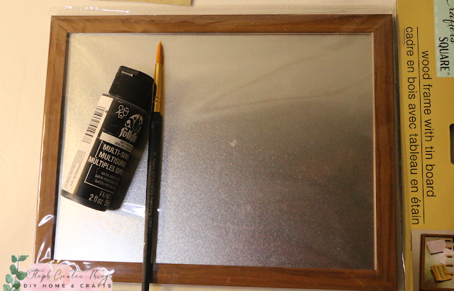 Paint, paintbrush, and memo board