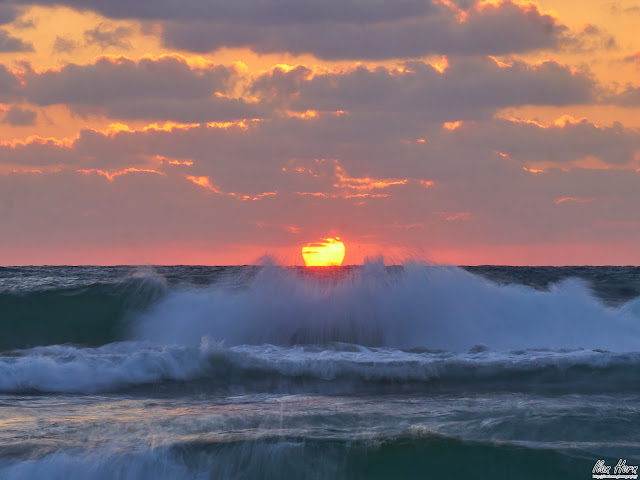 Sun Disappearing in the Waves