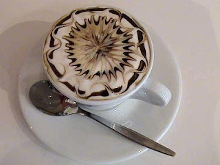 creamy capucino with spiral flower design