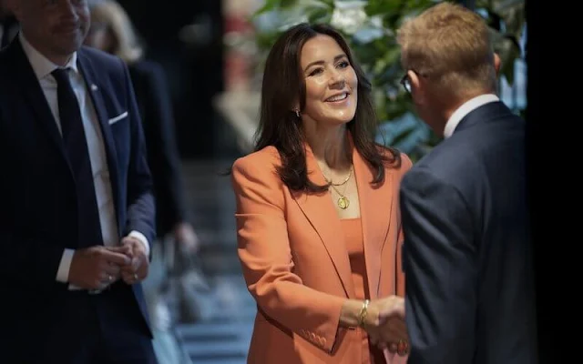 Crown Princess Mary wore coral tailored jacket and tailored wide-leg trousers, and orange top by Scanlan Theodore
