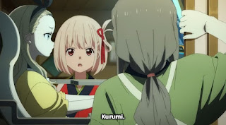 Kurumi using the computer while Chisato opens the door