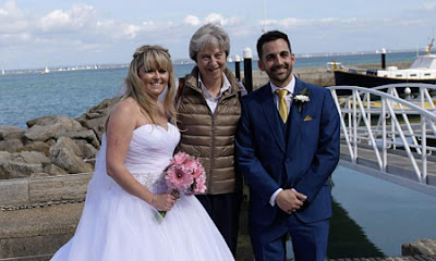 https://www.independent.co.uk/news/uk/politics/theresa-may-wedding-crasher-isle-of-wight-michelle-jason-dight-a8543476.html