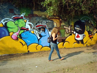 street art graffiti by Kofie Eye and Cache