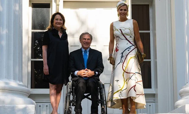 Queen Maxima wore a hand-painted silk and cotton shantung dress by Natan. Tussore silk dress