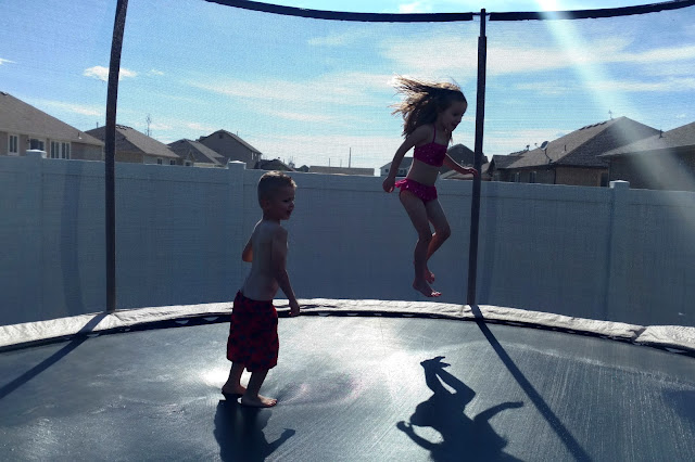 Sprinklers under the trampoline is a great way to cool off and burn off some energy.