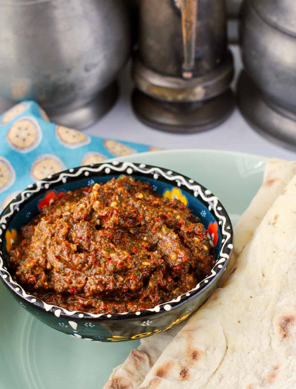 Red Zhug (Yemenite Hot Sauce) on a plate with lavash.