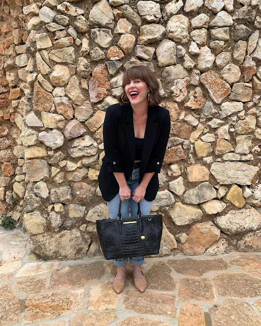 black blazer, jeans and a red lip