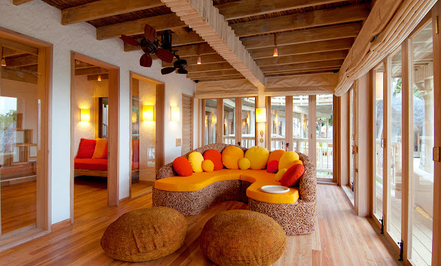 Photo of wooden sofa inside of one of the resort residences