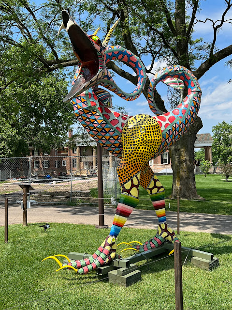 This vibrant alebrije looks like a rooster-snake mix.