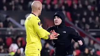 PSV supporter arrested for kicking Sevilla's goalkeeper
