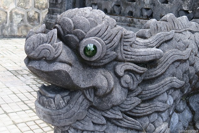 Stone dragons on the stairs of the stele pavilion at tomb of Khai DInh