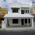 Fachada de casas de dos plantas con balcon