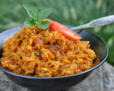 Red Rice with Tomatoes ♥ KitchenParade.com, a lovely rouge-tinted vegan summer side dish.