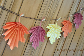 http://www.happyclippings.com/2013/09/diy-folded-paper-fall-leaves.html